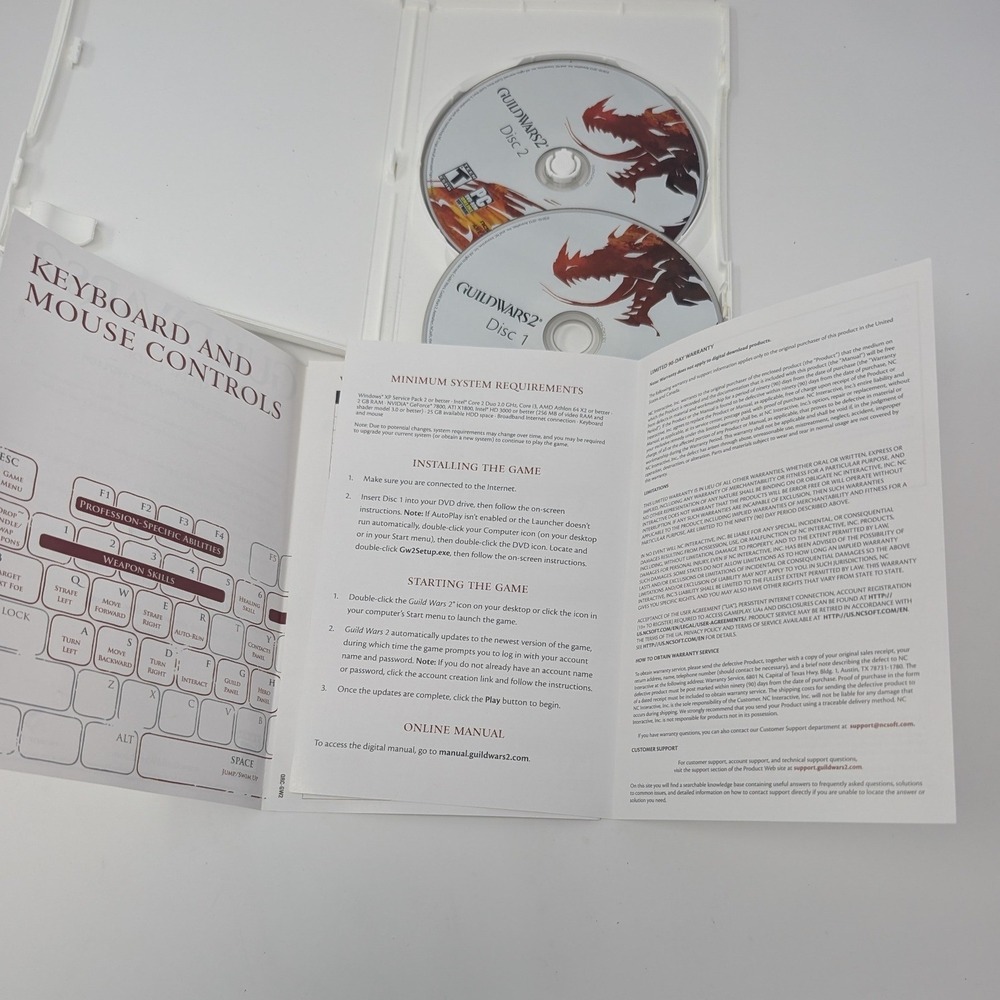 Guild Wars 2 PC Game DVD-ROM ArenaNet 2-Disc Set with Manual and Serial Code - Picture 7 of 11
